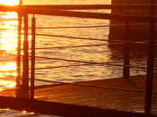 Reflexo do pôr-do-sol nas águas do rio Tejo