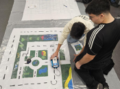 12.ª edição da Feira da Matemática Dois participantes em anterior edição da Feira da Matemática