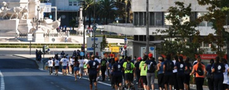 Pessoas a correr junto ao Marquês de Pombal